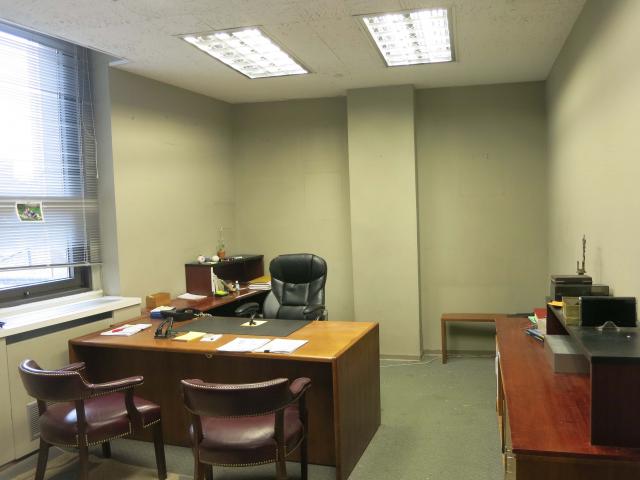 15 Maiden Lane New York NY Alternate perspective - desk area in large office
