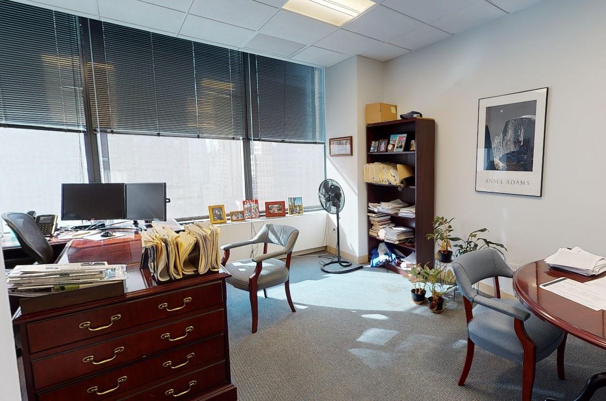 565 5th Avenue New York NY 3-window office with conference table