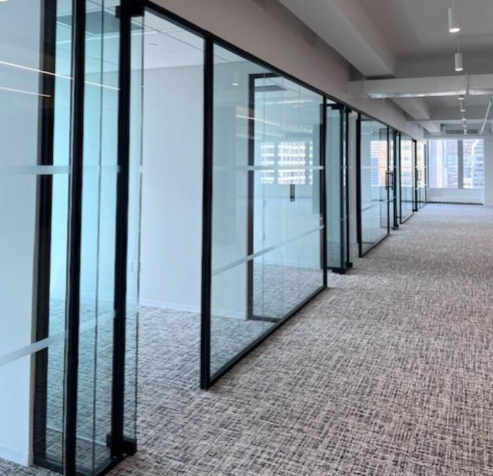 825 Third Avenue New York NY Row of glass wall offices example finishes