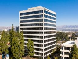 Class A office building Woodland Hills with floor-to-ceiling windows and freeway visibility
