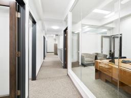 Professional office hallway glass offices attorney workspace legal office space corridor